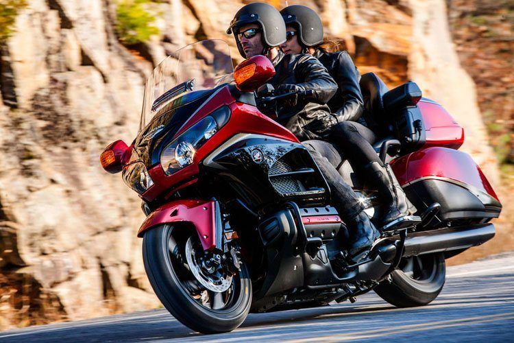 Man & Woman Riding a Gold Wing Motorcycle 